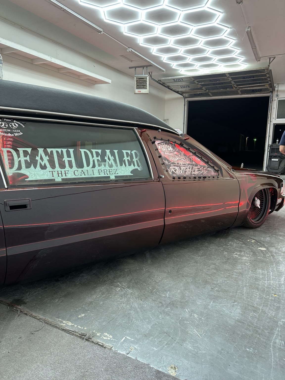 Side view of a custom show vehicle in the workshop